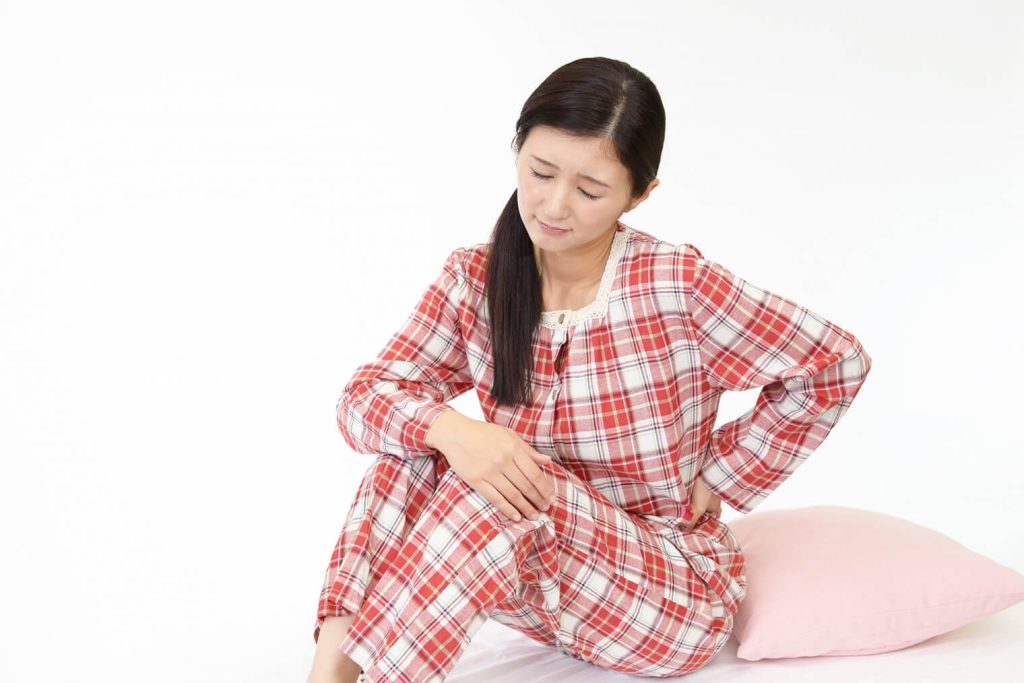 腰痛の女性