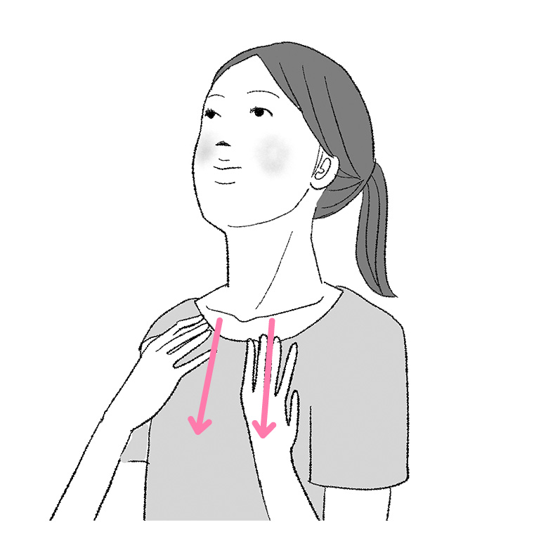 鎖骨の下を引っ張り胸を広げて上を向く
