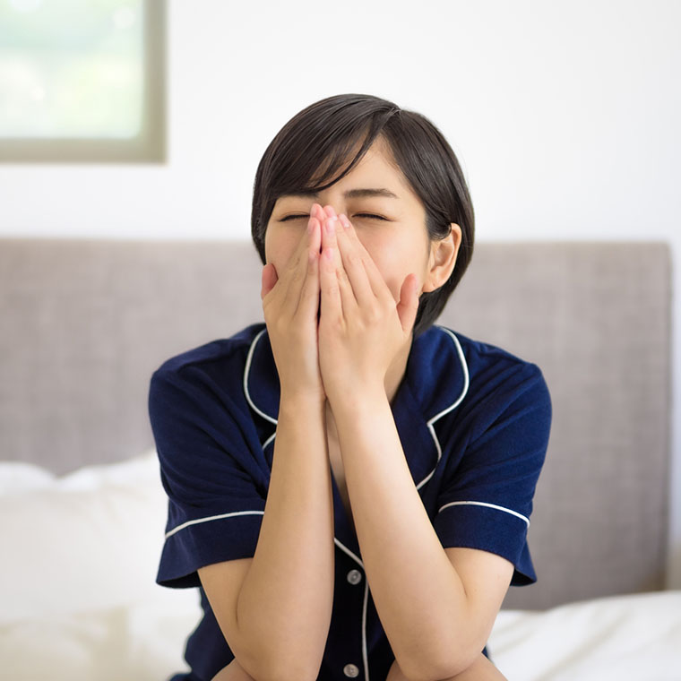 睡眠不足の女性