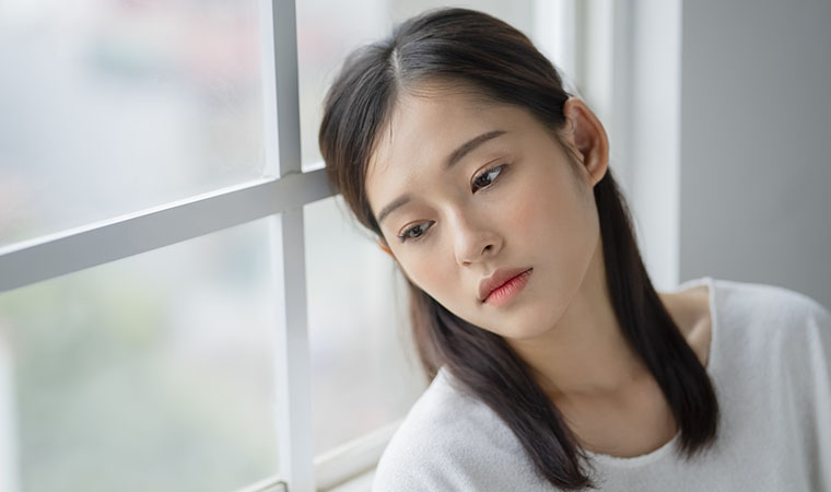 不調な女性