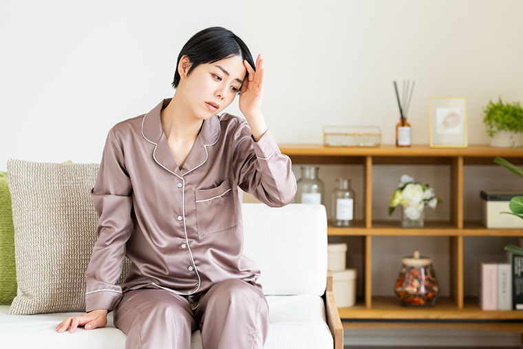 体調不良な女性