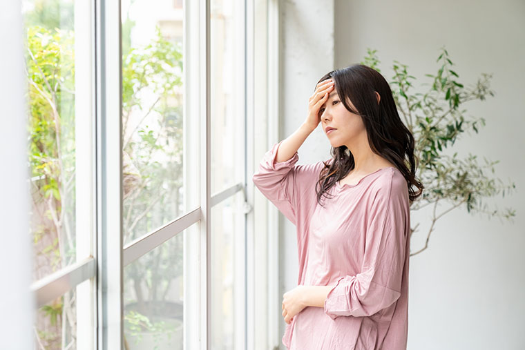 体調不良な女性