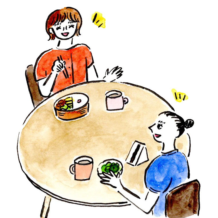 友人とおしゃべりする女性